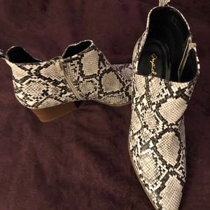 Snake print booties with pointy toe